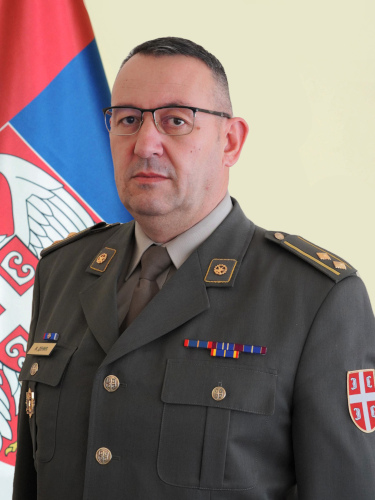 Подполковник Игор Дениħ. Эмблемы технической 
	службы